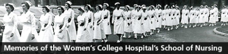 black and white photo of a line of walking nurses in white aprons