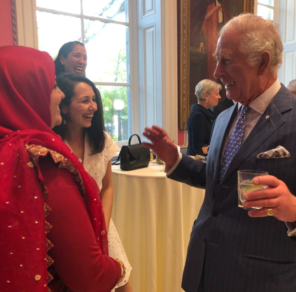 prince Charles speaks to two women