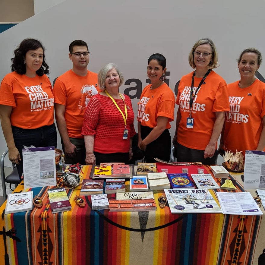 Centre For Wise Practices staff, Downie Wenjack Fund and WCH leaders at 2019 Orange Shirt Day atrium info table